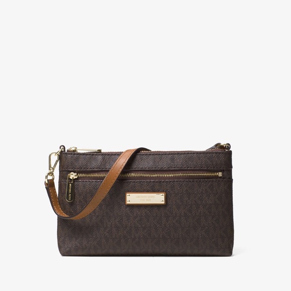 Michael Kors Handbags - NWOT Michael Kors Jet Set Travel L Logo Wristlet